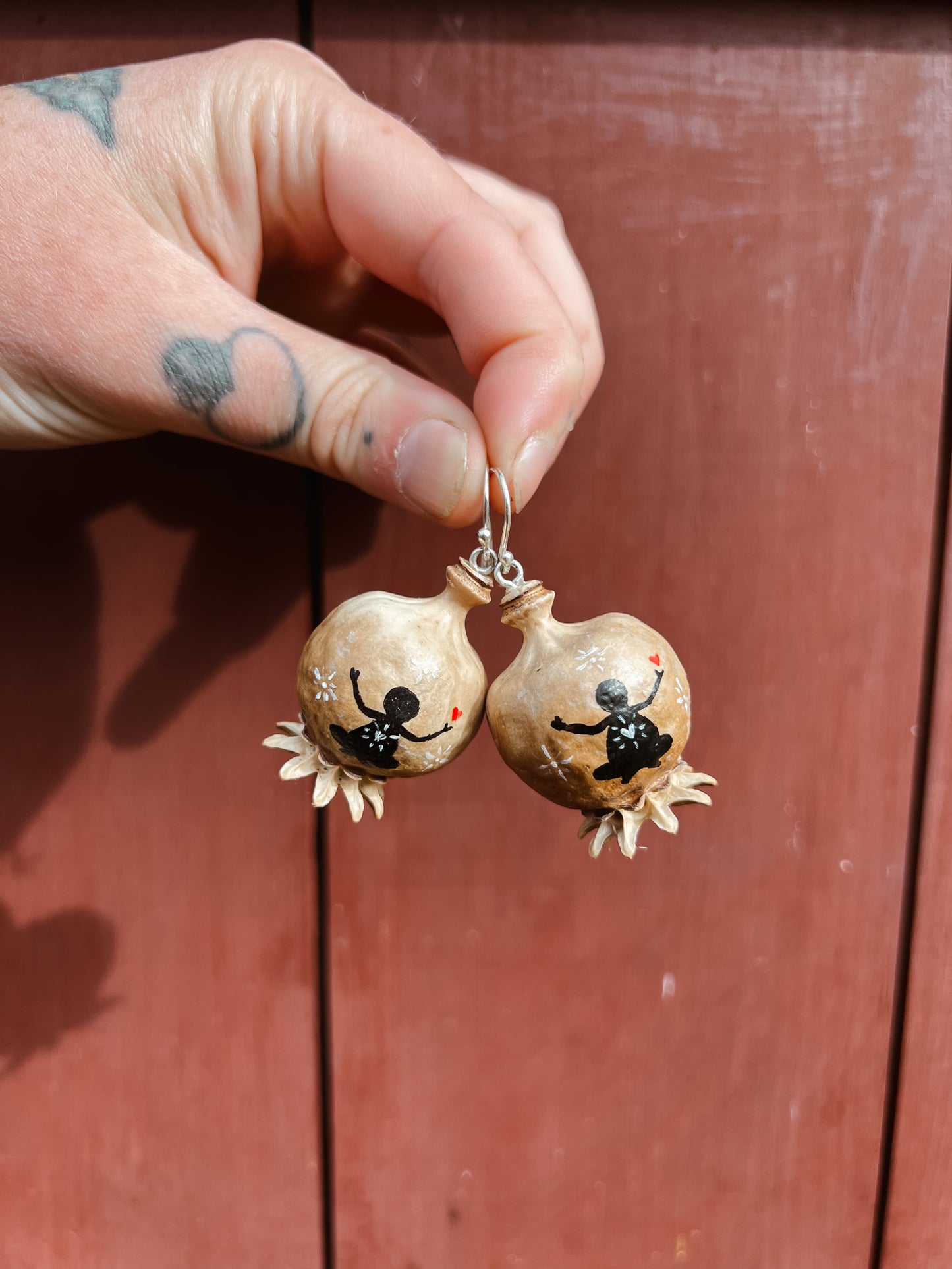 ‘Meditating Baby’ Poppy head earrings
